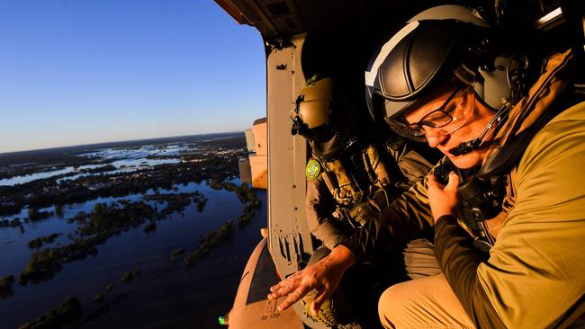 Scott Morrison inspects the flood damage around Sydney from an Australian Army helicopter on Wednesday. Picture: AFP