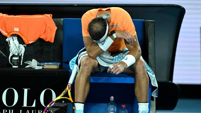 Rafael Nadal was injured at the Australian Open in 2023. (Photo by MANAN VATSYAYANA / AFP)