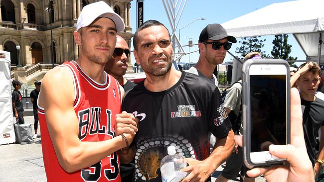 Anthony Mundine talks poses for photos with fans after a sparring session. Picture: AAP Image/Dan Peled