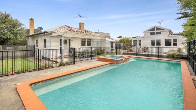 Decked outdoor entertainment areas overlook the swimming pool and spa.