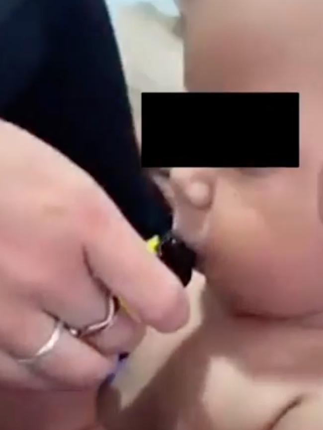 A distressing video of an 11-month-old baby boy smoking a vape has surfaced online sparking anger. Picture: 7 NEWS