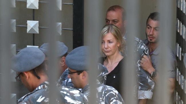 A mother’s heartbreak. Sally Faulkner, centre, led away from court in Lebanon. Picture: Liam Kidston