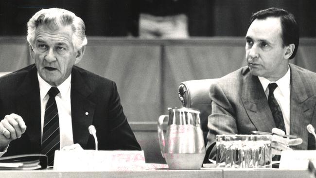 Bob Hawke addresses the premiers conference in Parliament House, while his Paul Keating, looks on. Picture: Steve Porritt