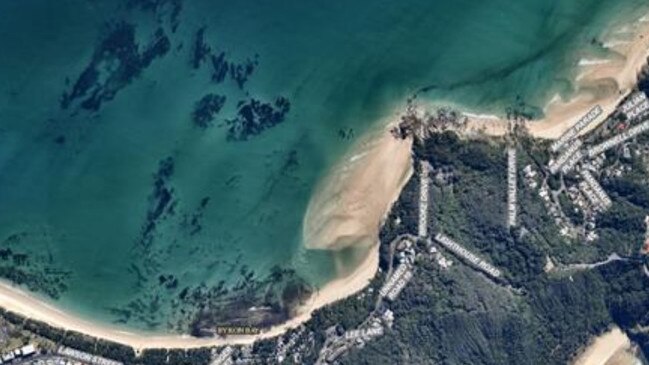 An aerial image showing a slug of sand at The Pass, Byron Bay, in August 2020.