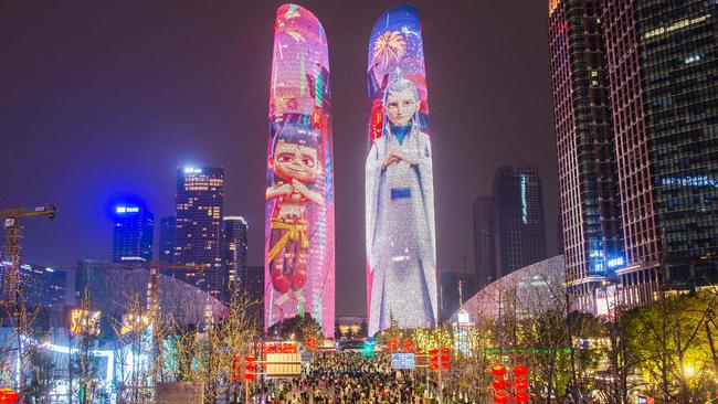 Buildings are lit up with characters from Ne Zha 2 in Chendu on February 12, 2025. Picture: AFP/China OUT.