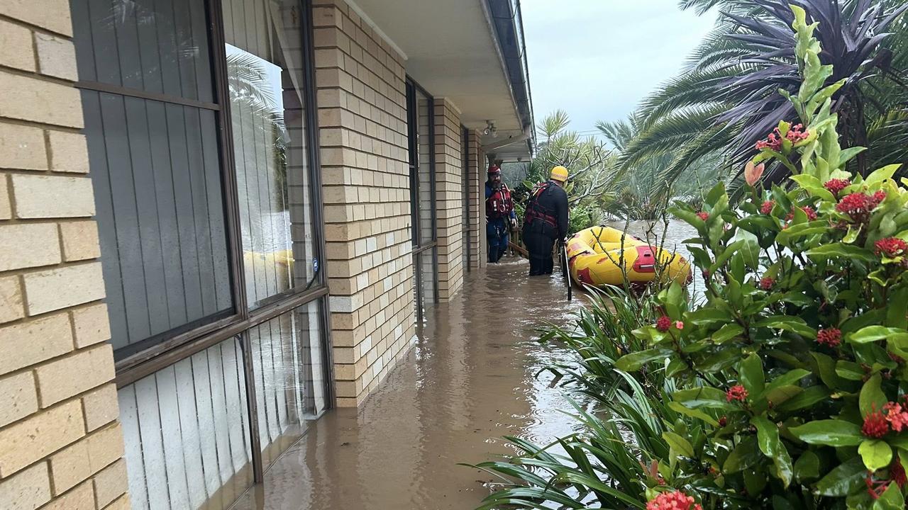 SES members rescue trapped residents via boat. Picture: SES via NewsWire