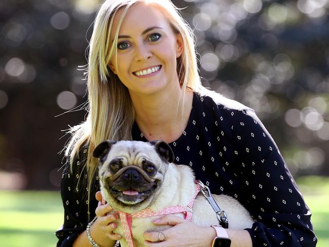 NSW Government MPs come together for Dogs in Politics Day, a joint venture to raise awareness for all dogs still looking for a home and to encourage people looking to adopt not shop and save a life. Animal Justice Party MP Emma Hurst pictured with Mia the pug in the Domain. Picture: Toby Zerna