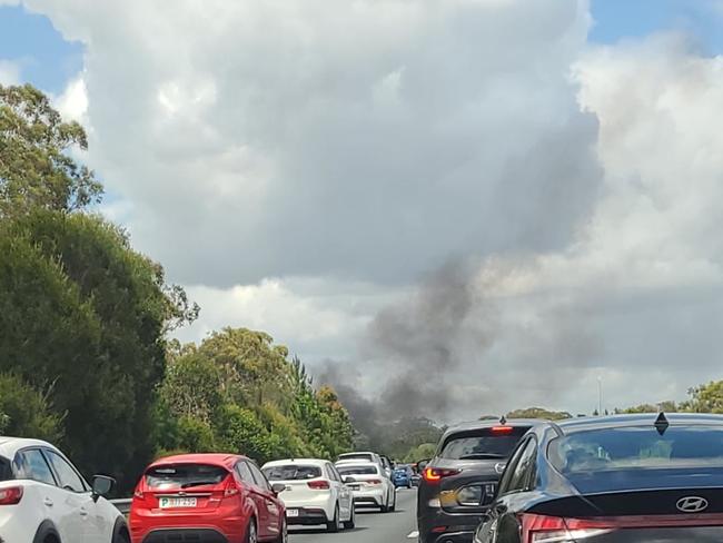 Traffic was at a standstill after a vehicle caught fire in Coochin Creek on the Bruce Hwy Sunday morning. Photo: Joanne McCabe.