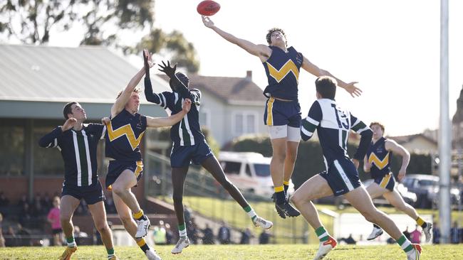 Cooper Trembath of Whitefriars College attempts to mark the ball. Picture: Daniel Pockett/AFL Photos/via Getty Images