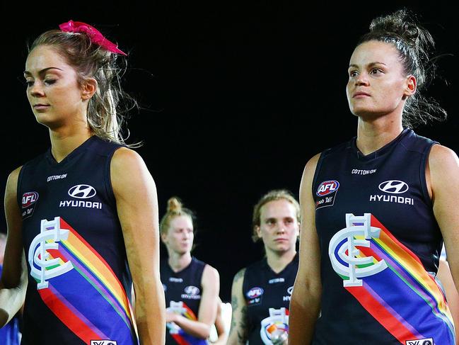 MELBOURNE, AUSTRALIA - FEBRUARY 23:  Blues players look dejected after defeat during the round four AFLW match between the Western Bulldogs and the Carlton Blues at Whitten Oval on February 23, 2018 in Melbourne, Australia.  (Photo by Michael Dodge/Getty Images)