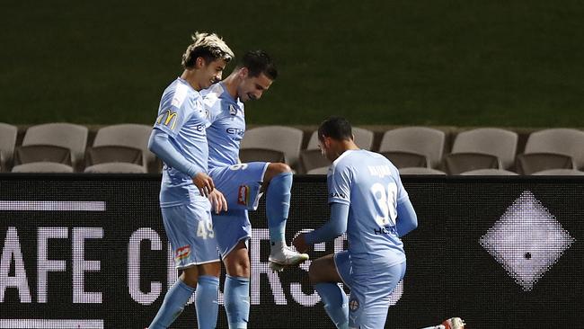 Jamie Maclaren’s work is acknowledged by his grateful Melbourne City teammates. Picture: Ryan Pierse/Getty Images