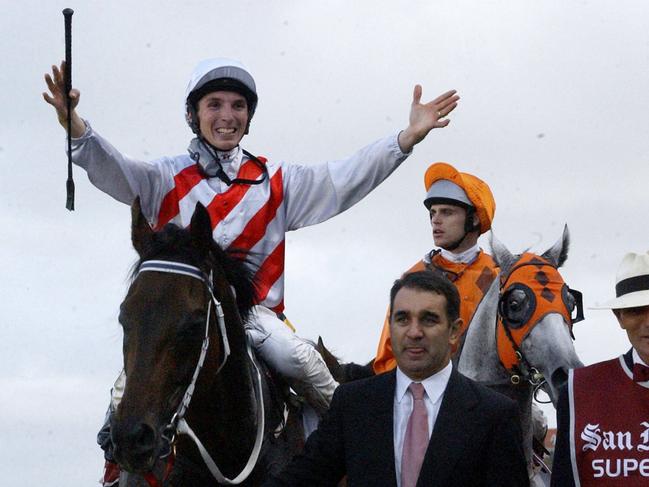 Sydney, April 19, 2003. Derby Day at Randwick Races Race 8 - The San Miguel Doncaster Hcp. "Grand Armee" ridden by Danny Beazley, riding into the winners circle. (AAP Image/Mick Tsikas) NO ARCHIVING