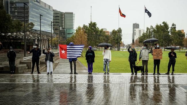 The Black Lives Matter protest in Adelaide in the rain on Saturday. Picture: Mike Burton