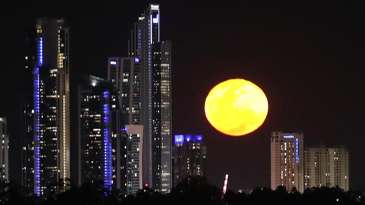 Get set for a special supermoon tonight, like this one appearing between the high rise buildings at Surfers Paradise in QLD in September 2023. Picture Glenn Hampsongh