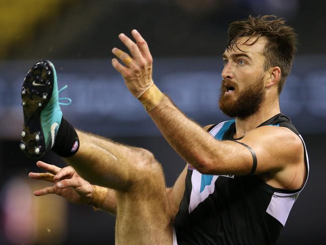 AFL Round 6. 28/04/2018. North Melbourne v Port Adelaide at Etihad Stadium.  Port Adelaide's Charlie Dixon kicks at goal 4th qtr  . Pic: Michael Klein