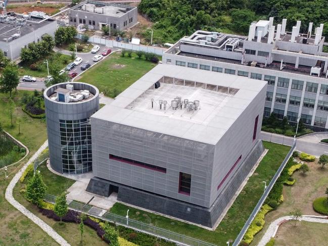 This aerial view shows the P4 laboratory (C) on the campus of the Wuhan Institute of Virology in Wuhan in China's central Hubei province on May 13, 2020. - Opened in 2018, the P4 lab, which is part of the greater Wuhan Institute of Virology and conducts research on the world's most dangerous diseases, has been accused by top US officials of being the source of the COVID-19 coronavirus pandemic. (Photo by Hector RETAMAL / AFP)