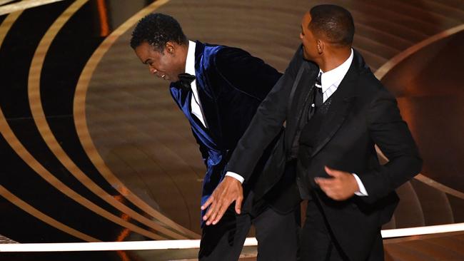 The moment Will Smith stormed the Oscars stage and slapped Chris Rock was a moment you simply could not write. Picture: AFP.