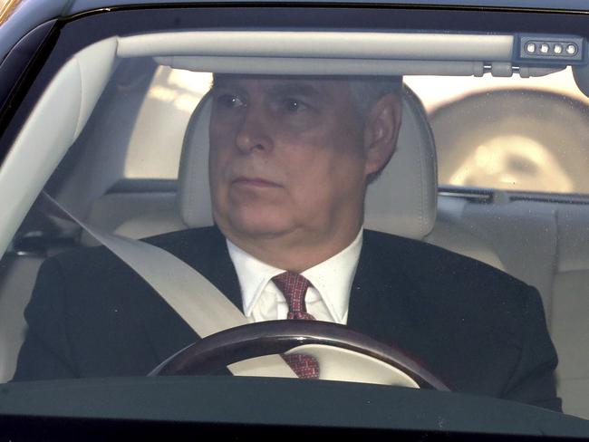 Prince Andrew pictured as he drove into Buckingham Palace for the Queen's Christmas lunch. Picture: AP