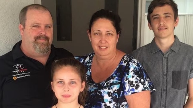 Nicole Duncan with husband Brian Rickson and daughter Jade and son Mitchell. She took on a maternal role at the Brisbane Lions, where she worked for 31 years. Picture: Contributed