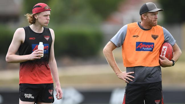 Like father, like son: Mason Fletcher and father Dustin at Essendon training. Picture: Getty Images