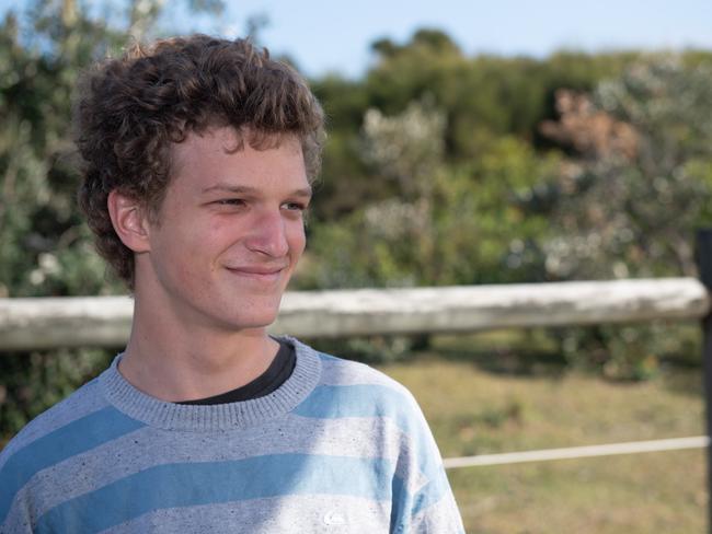 Matt Simon of Emerald Beach bumped by a shark while surfing.