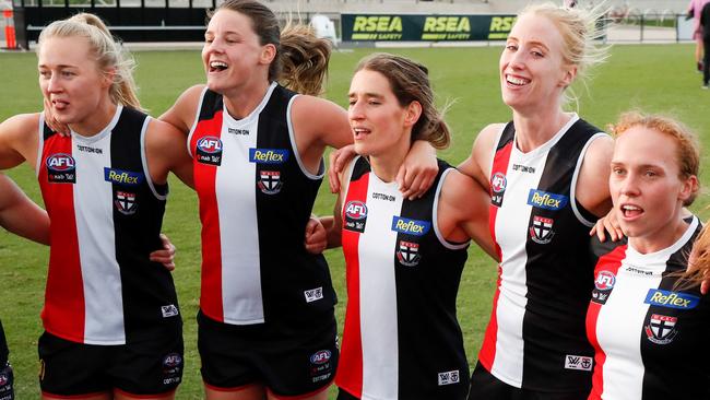 St Kilda’s women’s team marches in.