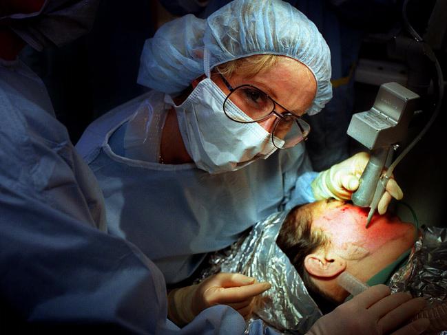 Cynthia Weinstein performing a skin resurfacing operation.