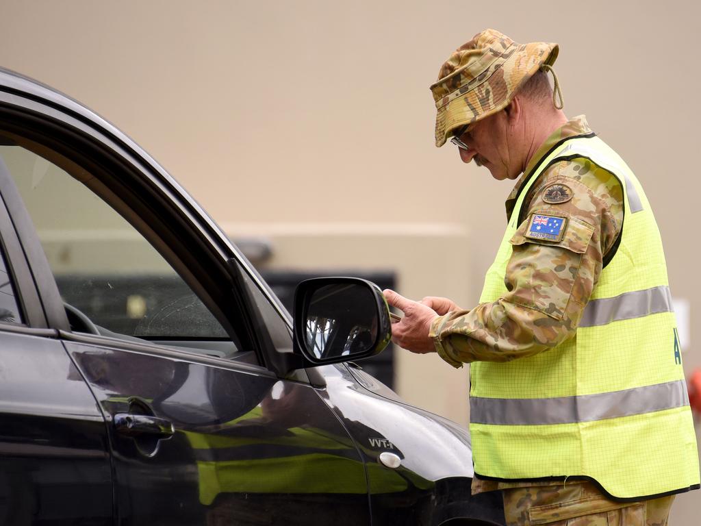 ADF personnel will be pulled from the Queensland border one day before the state reopens to parts of NSW. Picture: NCA NewsWire / Steve Holland