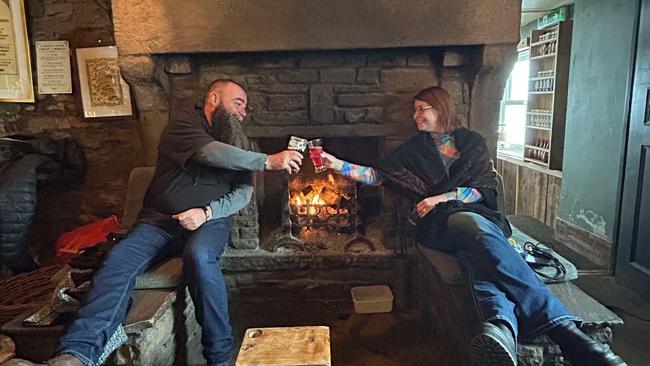 There are definitely worse places to see out a snow storm than an old British pub. Picture: Paul Wright