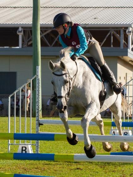 Megan Bauman and CR Cruising at the PQC State Showjumping Championships.