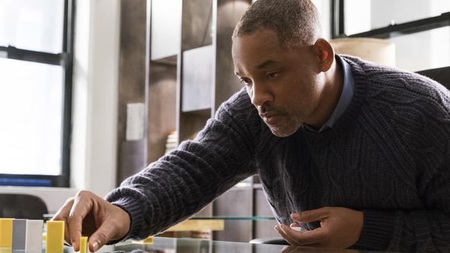 Smith’s character fosters a very deep and meaningful obsession with setting up dominoes in the film. Picture: Barry Wetcher/Warner Bros. via AP