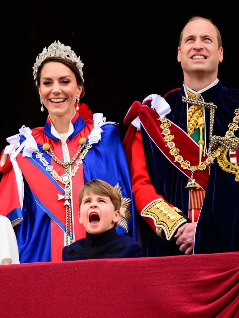 Princess Catherine, Prince Louis and Prince William watch the Royal Air Force fly-past. Picture: AFP