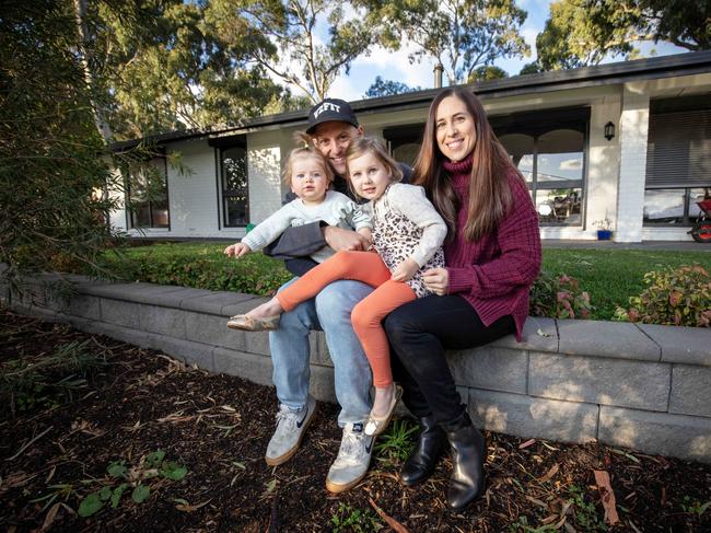 ADELAIDE, AUSTRALIA - ADVERTISER Photos - MAY 6, 2023: Budget case study - Mortgage holders, Dan and Cian Peters with children Lainie 5yrs and Mollie 1yr old outside their Coromandel Valley home. Picture: Emma Brasier