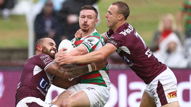 Damien Cook was hard to contain in the slippery conditions at Brookvale. Picture: Getty Images