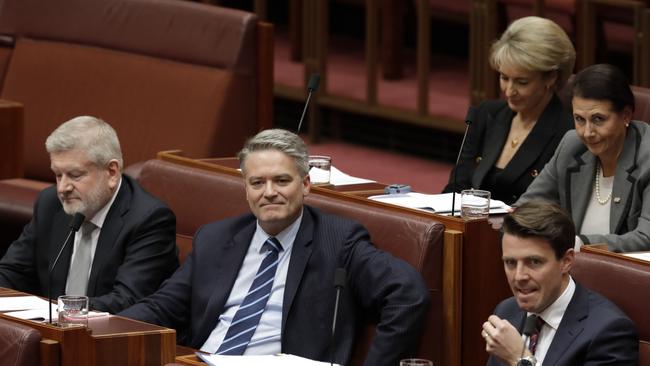 Recently resigned ministers Mitch Fifield, former leader of the Senate Mathias Cormann and Michaelia Cash in the Senate after their momentous morning press conference. Picture: Sean Davey