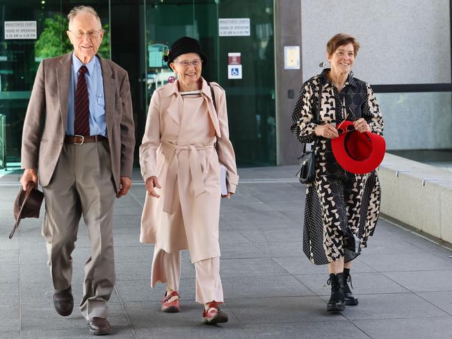 Extinction Rebellion State Parliament protesters leave the Brisbane Magistrates court after they were sentenced. Dr Lee Coaldrake (right) was sentenced on a previous date. Picture: Tertius Pickard