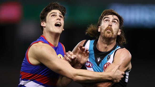 Scott Lycett rucks against Western Bulldogs’ Lewis Young. Picture: Michael Klein