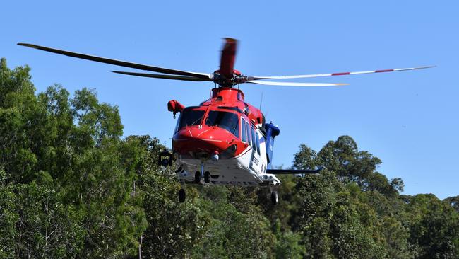 An emergency helicopter transporting a badly injured man to Townsville University Hospital after a horror crash between Cardwell and Ingham. Picture: CAMERON BATES