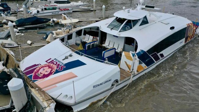 A damaged Brisbane CityCat after it was hit by a houseboat in the swollen river. Picture: Danielle Buckley