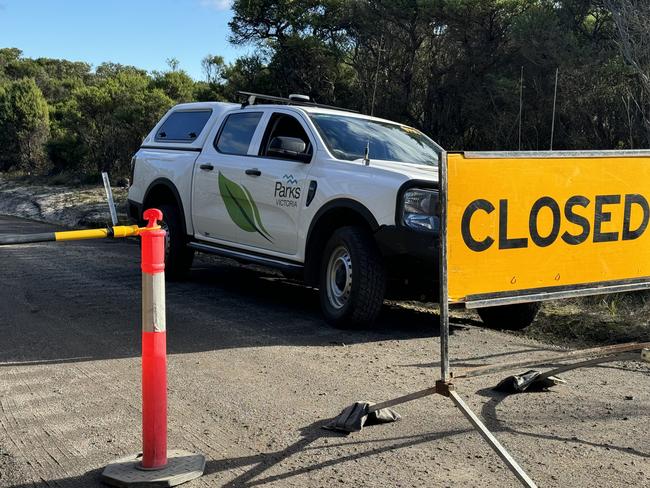 Two bodies have been found on an isolated track on the state’s southwest coast after a shooting., Police are at the scene in Gellibrand Lower where the pair was found The walking track to the beach is blockedPicture: Alan Barber