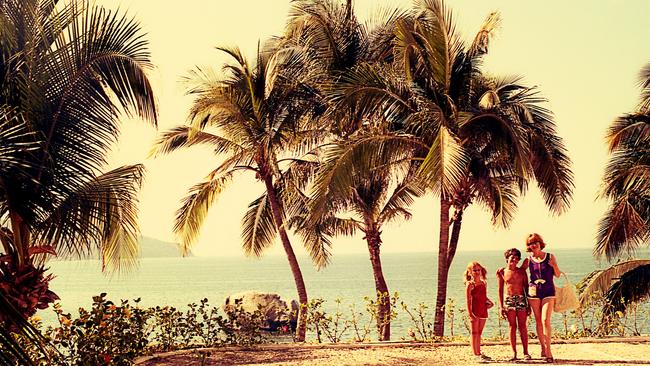 A mother and her children during a summer vacation in the seventies; a time when travel was very different to now.