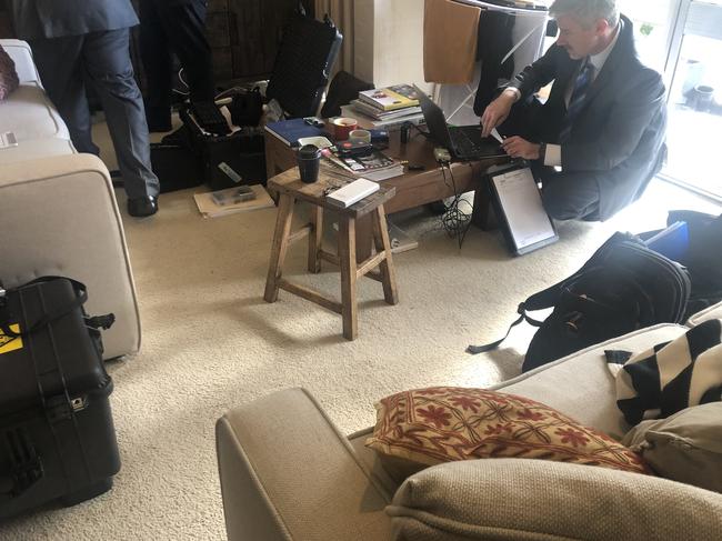 Federal police going through Annika Smethurst’s home in Canberra. Picture: Supplied