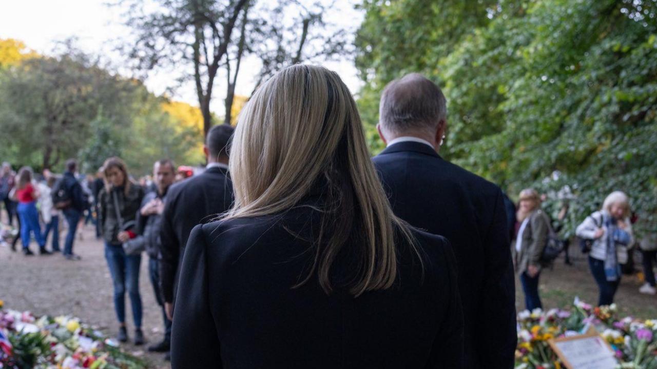 Prime Minister Anthony Albanese and partner Jodie Haydon walk past rows of tributes at Green Park. Picture: PMO via NCA NewsWire