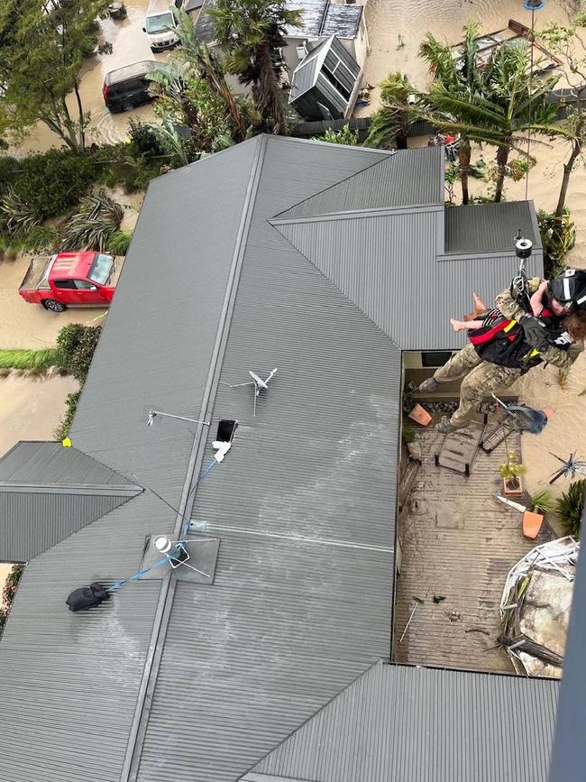 Residents are rescued from their rooftops in Esk. Picture: Hawkes Bay Civil Defence.