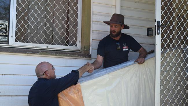 Vincent Marychurch was offered a mattress from Mud-Army rep Darren Nelson’s business ‘Solace’ Picture: Nicholas Rupolo.