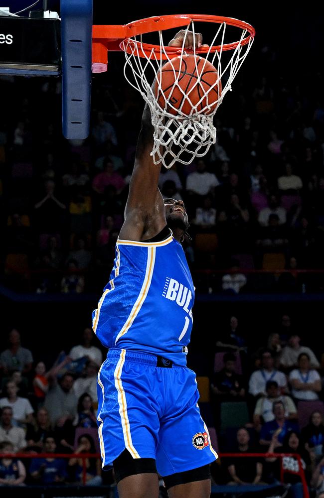 Brisbane Bullets star Keandre Cook slam dunks during the NBL game against the Breakers. Picture: Getty Images