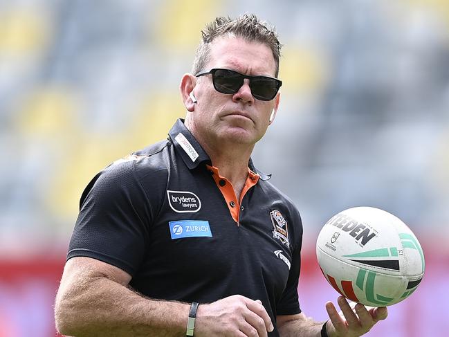 TOWNSVILLE, AUSTRALIA - SEPTEMBER 07: Tigers coach Brett Kimmorley looks on before the start of the round seven NRLW match between North Queensland Cowboys and Wests Tigers at Queensland Country Bank Stadium on September 07, 2024 in Townsville, Australia. (Photo by Ian Hitchcock/Getty Images)