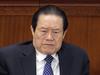 TO GO WITH China-politics-corruption,ANALYSIS by Felicia SONMEZ (FILES) This file picture taken on March 5, 2012 shows Zhou Yongkang, then a member of the Standing Committee of the Political Bureau of CPC, attending the opening session of the National People's Congress (NPC) at the Great Hall of the People in Beijing. China's Xi Jinping is emerging as the country's most powerful leader in decades, analysts said, after the declaration of a probe into the country's former security chief, as state media on July 30, 2014 hailed the groundbreaking move. Zhou Yongkang wielded control of China's police, courts, jails and domestic surveillance until his retirement from the elite Politburo Standing Committee (PSC) in 2012. AFP PHOTO / LIU JIN / FILES