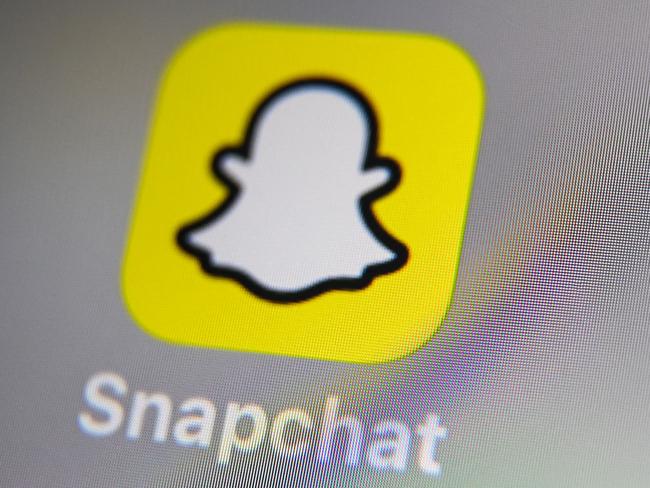 (FILES) This file photo taken on October 01, 2019, shows the logo of mobile app Snapchat displayed on a tablet in Lille. - US tech firm Snap on June 29, 2022, launched a subscription version of Snapchat as it looks to generate more money from the image-centric, ephemeral messaging app. (Photo by DENIS CHARLET / AFP)