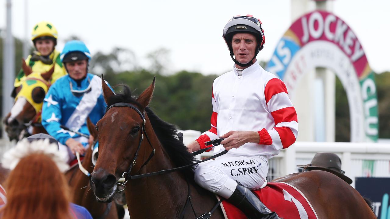 The Georgie and Aidan Holt-trained Let’s Go Bobby, ridden by jockey Carl Spry, wins the Belle of the Daintree Fillies and Mares Benchmark 70 Handicap (1500m) at Cannon Park. Picture: Brendan Radke.